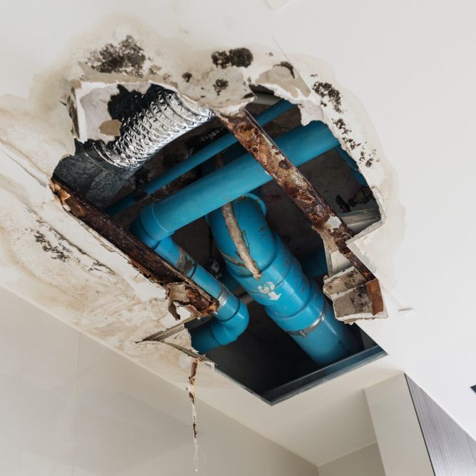 Damaged-Ceiling-Water-Leaking-Pipes-House